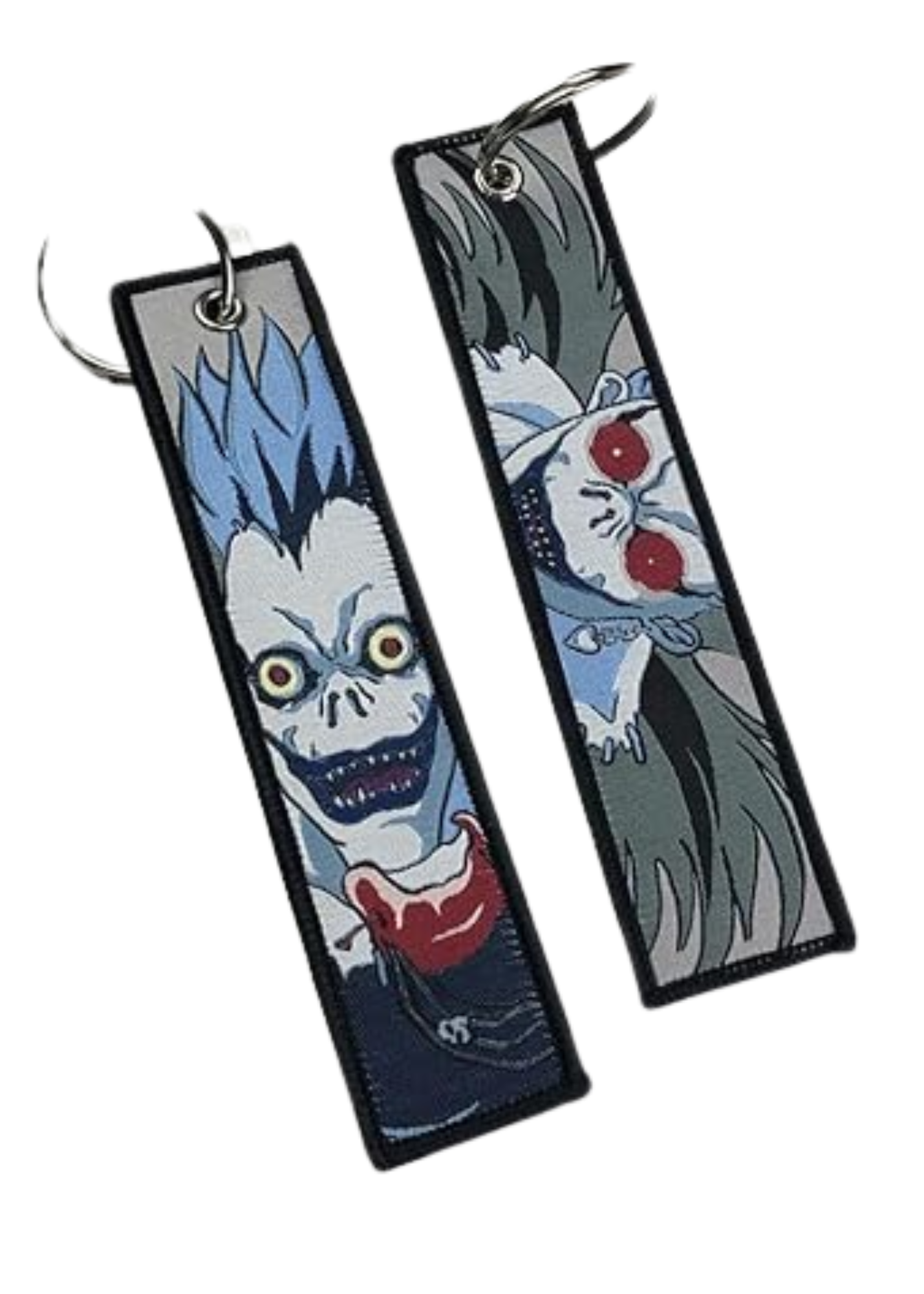 Two rectangular cloth keychains with anime character designs, attached to stainless steel keyring.