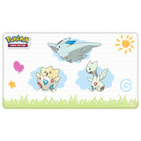 Pokémon trading card game playmat with four characters on a white background